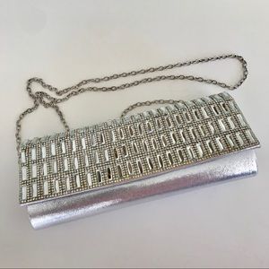 Cute silver jeweled clutch with chain